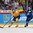 HELSINKI, FINLAND - JANUARY 4: Sweden's Axel Holmstrom #25 skates with the puck while fending off Finland's Julius Nattinen #25 during semifinal round action at the 2016 IIHF World Junior Championship. (Photo by Andre Ringuette/HHOF-IIHF Images)

